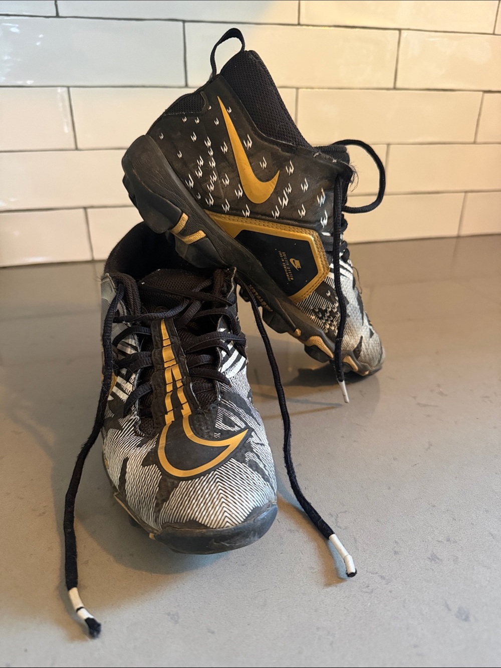 Nike kids Black & Gold Football Cleats